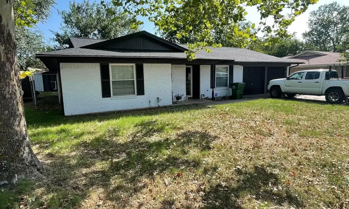 Professional roofing crew working on a residential roof in Murrells Inlet